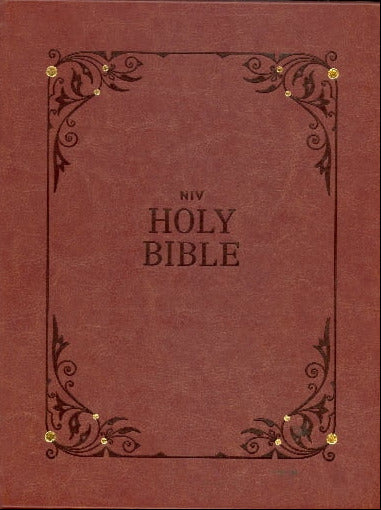 Brown leather-bound Bible with decorative corners and gold rivets