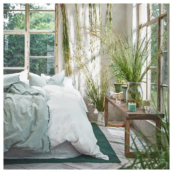 IKEA Hedersam scented candle in glass fresh grass light green